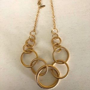 Cute gold necklace , interlocking circles design